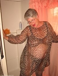 Big momma Girdlegoddess is sexy hot in leopard print sheer cover up Just getting ready for a nice shower Look at how nice and WET i am